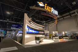 20x20 Peninsula booth design by The Trade Group
